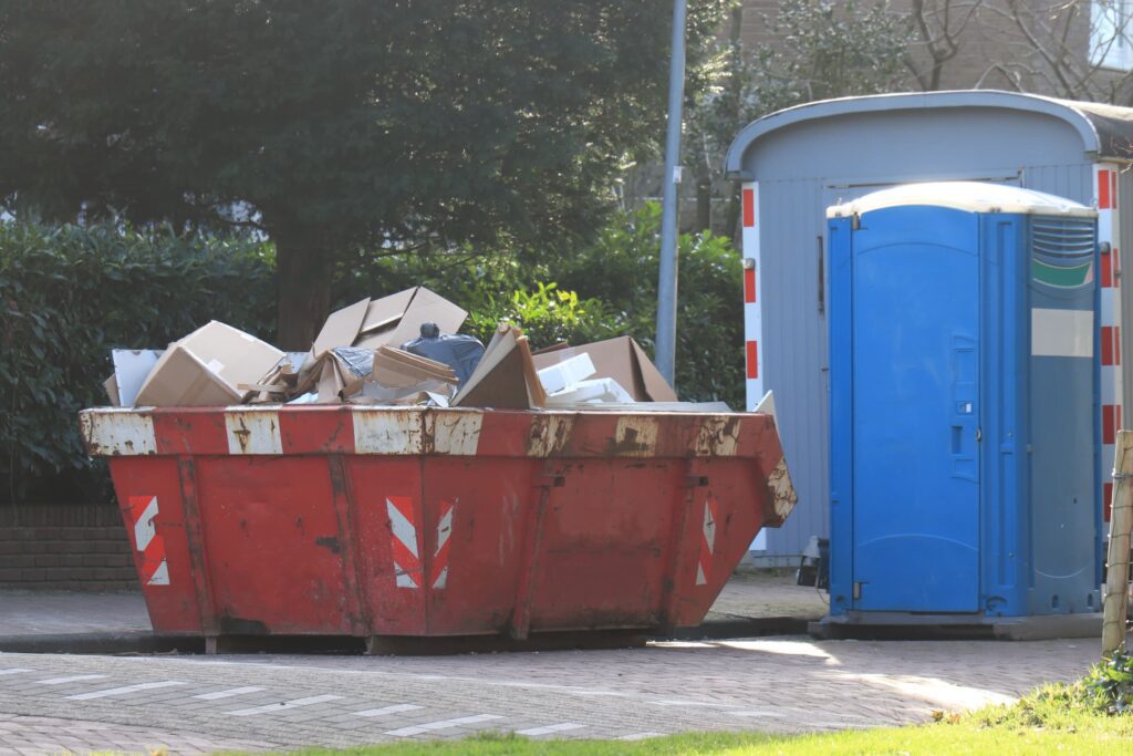 commercial skip hire skip with portaloo