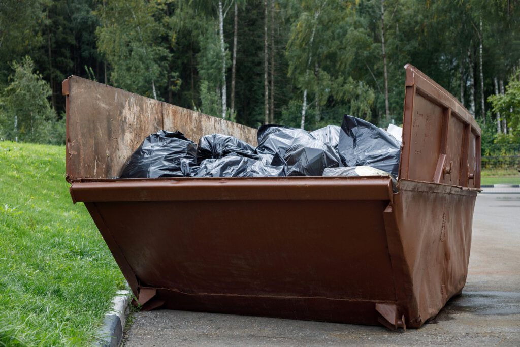 skip full of bin bags